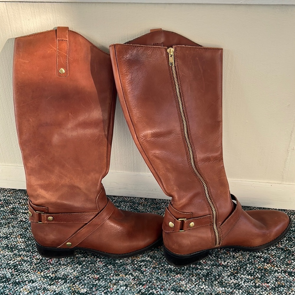Tall brown leather boots
